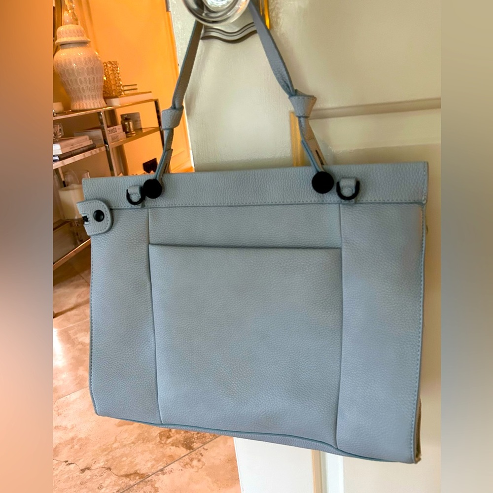Foley and Corinna powder blue handbag.